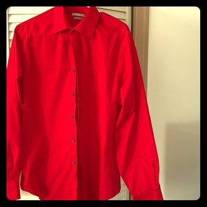 Red Van Heusen button down dress shirt.